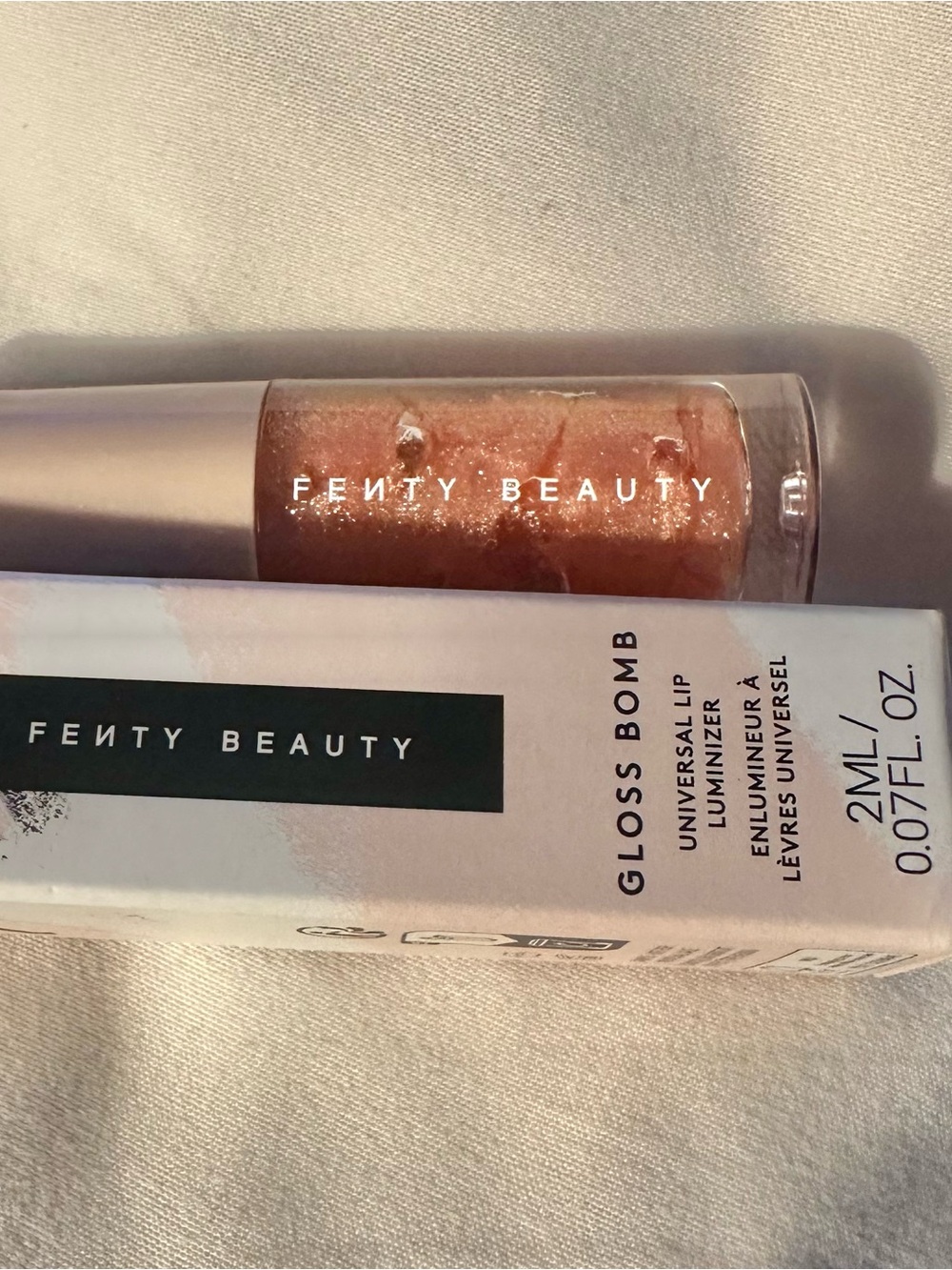 Fenty Beauty Gloss Bomb Lip Luminizer — Shimmery Peachy Gold